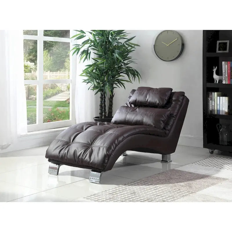 Upholstered Chaise Lounge with Arched Chrome Base and Accent Pillow